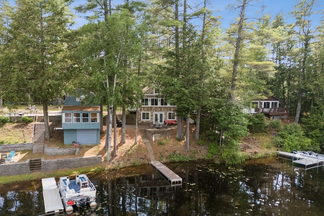 115 34th St, Acton, ME 04001 - dock featuring stairway, view of scattered trees, and a wooden deck