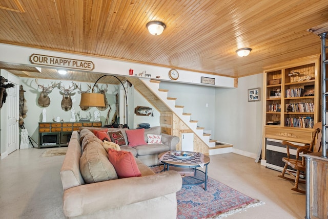 115 34th St, Acton, ME 04001 - living room featuring concrete floors, stairs, and wooden ceiling