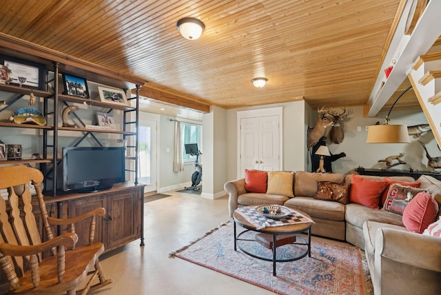 115 34th St, Acton, ME 04001 - living room with finished concrete floors and wooden ceiling