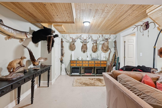 115 34th St, Acton, ME 04001 - living area with wooden ceiling and finished concrete flooring