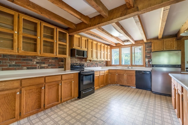115 Swain Farm Rd, Rumford, ME 04276 - kitchen with black appliances, beamed ceiling, light countertops, brown cabinetry, and light floors