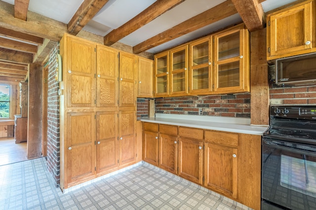 115 Swain Farm Rd, Rumford, ME 04276 - kitchen featuring black appliances, beam ceiling, light countertops, and glass insert cabinets