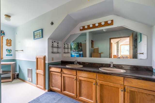 115 Swain Farm Rd, Rumford, ME 04276 - full bathroom featuring double vanity, vaulted ceiling, and a shower with curtain