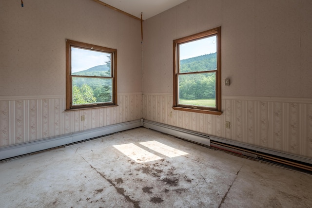 115 Swain Farm Rd, Rumford, ME 04276 - unfurnished room with wainscoting and unfinished concrete flooring