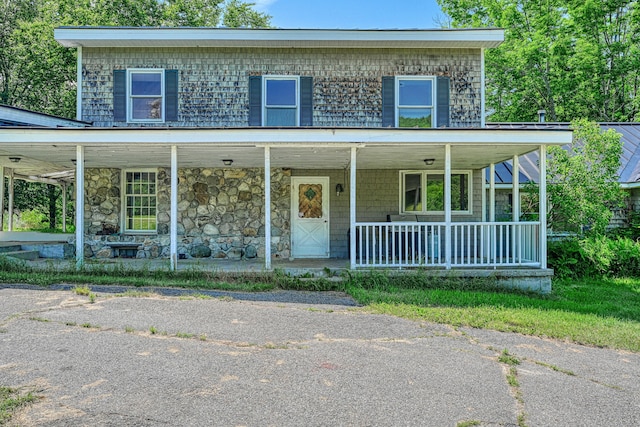 115 Swain Farm Rd, Rumford, ME 04276 - view of front of property featuring a porch and stone siding