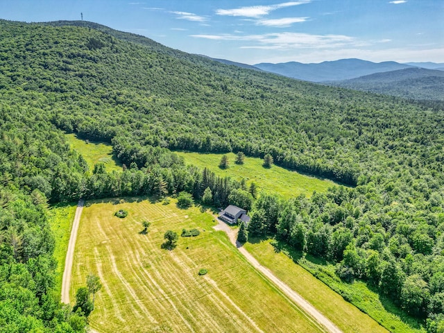115 Swain Farm Rd, Rumford, ME 04276 - drone / aerial view of a forest and a mountain backdrop
