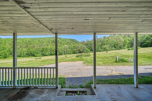 115 Swain Farm Rd, Rumford, ME 04276 - view of patio with a forest view