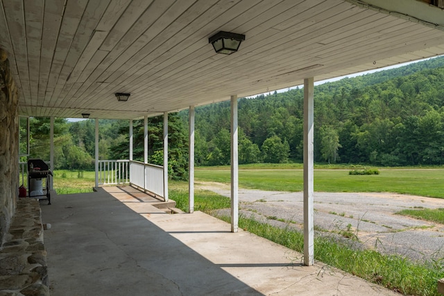 115 Swain Farm Rd, Rumford, ME 04276 - view of patio featuring a view of trees and a grill