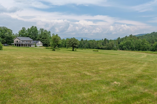 115 Swain Farm Rd, Rumford, ME 04276 - view of green lawn with a view of trees