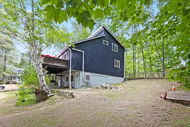 60 Butterworth Dr Unit 40, 46, Naples, ME 04055 - back of property with a wooden deck
