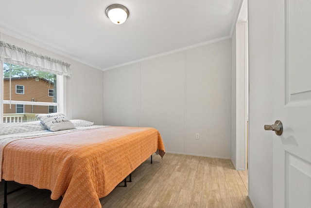 60 Butterworth Dr Unit 40, 46, Naples, ME 04055 - bedroom featuring light wood-style flooring and ornamental molding