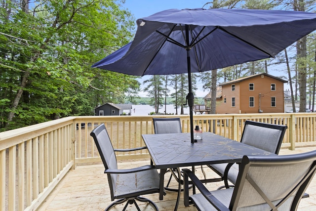 60 Butterworth Dr Unit 40, 46, Naples, ME 04055 - wooden deck featuring outdoor dining space