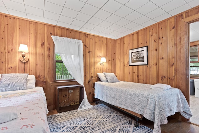 60 Butterworth Dr Unit 40, 46, Naples, ME 04055 - bedroom with multiple windows, wood walls, and wood finished floors