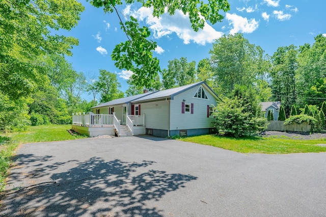 15 Vine St Unit B, South Berwick, ME 03908 - manufactured / mobile home with driveway, a front lawn, a metal roof, a chimney, and a deck