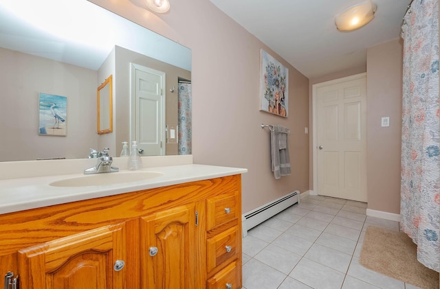 15 Vine St Unit B, South Berwick, ME 03908 - bathroom with a baseboard heating unit, tile patterned floors, and vanity