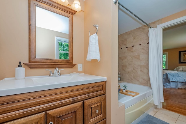 15 Vine St Unit B, South Berwick, ME 03908 - bathroom with shower / bathtub combination with curtain, vanity, healthy amount of natural light, and tile patterned flooring