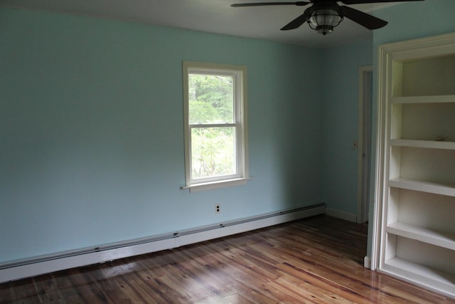 49 Horace Files Rd, Naples, ME 04055 - unfurnished room featuring baseboard heating, wood finished floors, and a ceiling fan