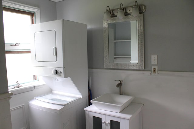 49 Horace Files Rd, Naples, ME 04055 - laundry room featuring stacked washer / drying machine