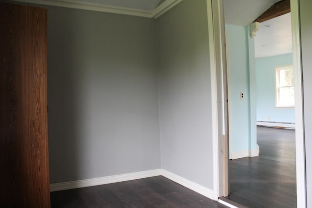 49 Horace Files Rd, Naples, ME 04055 - empty room featuring a baseboard heating unit, dark wood-style flooring, and ornamental molding