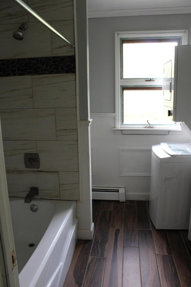 49 Horace Files Rd, Naples, ME 04055 - bathroom featuring a baseboard radiator, ornamental molding, shower / bathtub combination, wainscoting, and wood finished floors