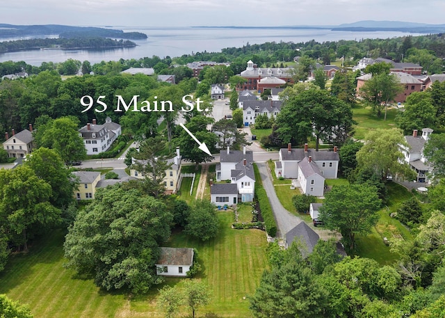 95 Main St, Castine, ME 04421 - aerial view of property and surrounding area with a large body of water and nearby suburban area
