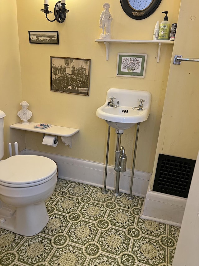 95 Main St, Castine, ME 04421 - half bathroom with tile patterned floors