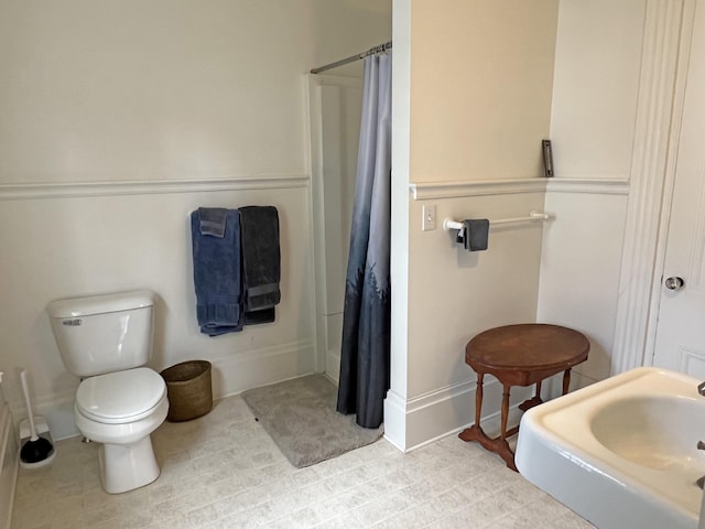 95 Main St, Castine, ME 04421 - bathroom featuring toilet and curtained shower
