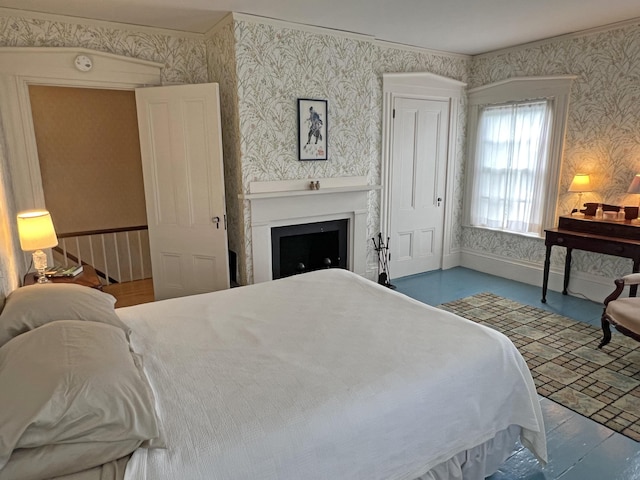 95 Main St, Castine, ME 04421 - bedroom with wallpapered walls and a fireplace