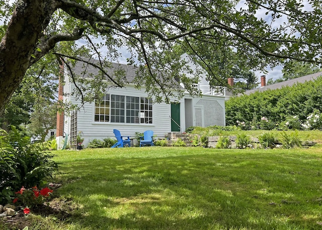 95 Main St, Castine, ME 04421 - rear view of property with a yard