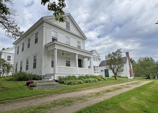 95 Main St, Castine, ME 04421 - neoclassical home featuring covered porch and a front yard