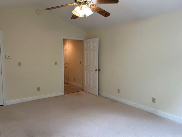 1 S Ridge Dr, Winslow, ME 04901 - unfurnished room featuring lofted ceiling, a ceiling fan, and light colored carpet