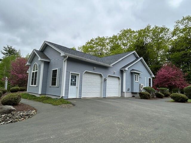1 S Ridge Dr, Winslow, ME 04901 - view of front of house featuring a garage and driveway