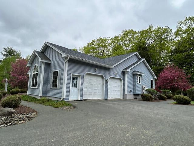 1 S Ridge Dr, Winslow, ME 04901 - view of front of property featuring a garage and driveway
