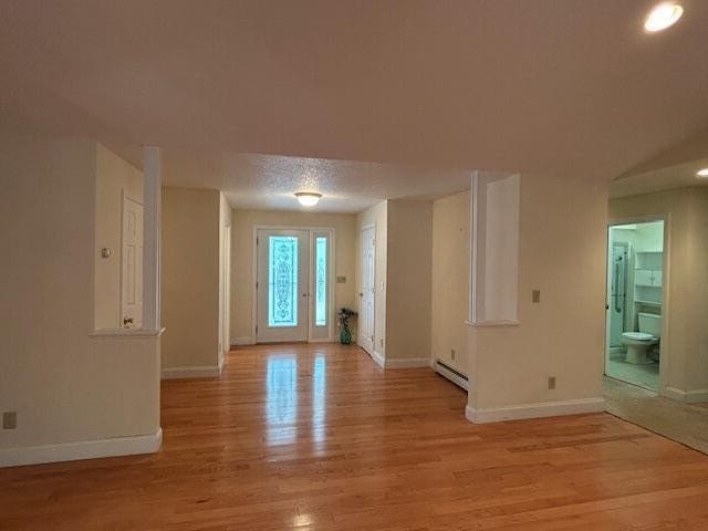 1 S Ridge Dr, Winslow, ME 04901 - entryway with a baseboard radiator, light wood-type flooring, and recessed lighting