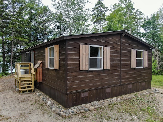 147 Loop Rd, Lincoln, ME 04457 - view of side of property featuring a wooden deck