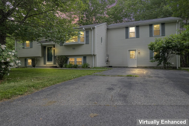 44 Ellen Cir, Yarmouth, ME 04096 - split foyer home with a front lawn and asphalt driveway