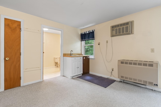44 Ellen Cir, Yarmouth, ME 04096 - miscellaneous room with heating unit, a wall unit AC, and carpet flooring