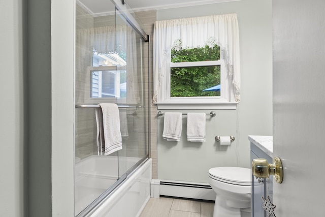 44 Ellen Cir, Yarmouth, ME 04096 - bathroom with a baseboard radiator, crown molding, bath / shower combo with glass door, vanity, and tile patterned flooring