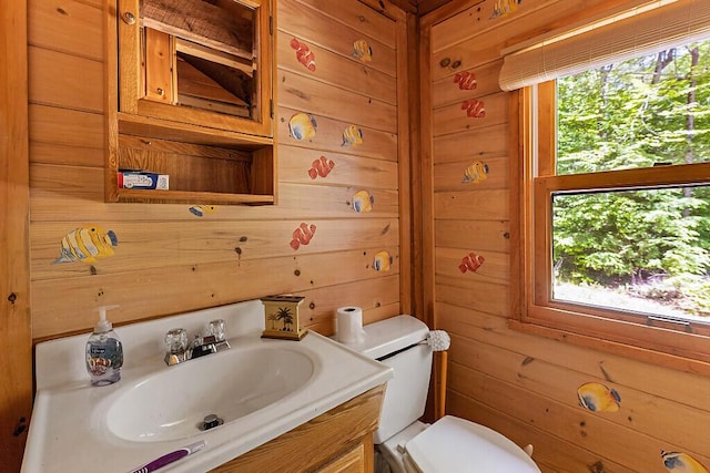 8 Horseshoe Is, Winthrop, ME 04364 - half bath featuring healthy amount of natural light, wooden walls, and vanity