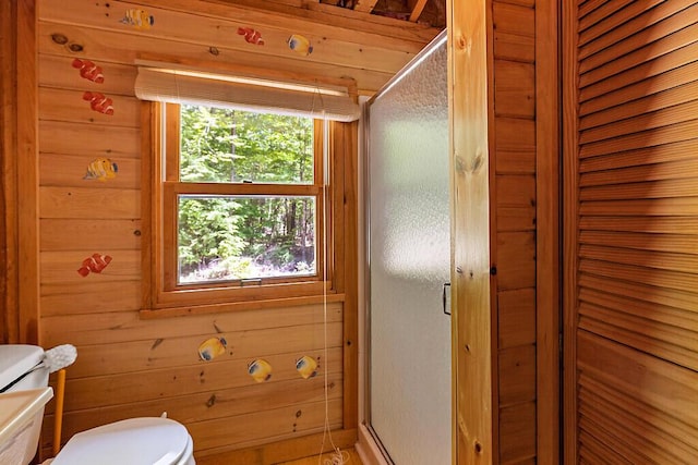 8 Horseshoe Is, Winthrop, ME 04364 - bathroom featuring a shower stall and wood walls