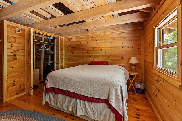 8 Horseshoe Is, Winthrop, ME 04364 - bedroom with wood walls and wood-type flooring
