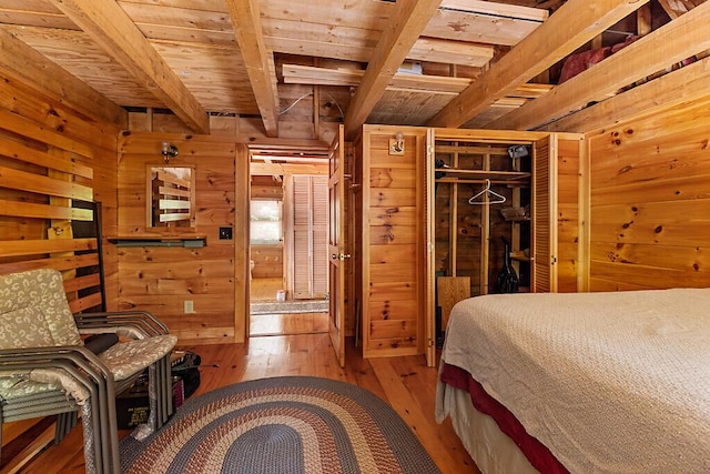 8 Horseshoe Is, Winthrop, ME 04364 - bedroom with wood walls, hardwood / wood-style flooring, and a wood ceiling with exposed beams