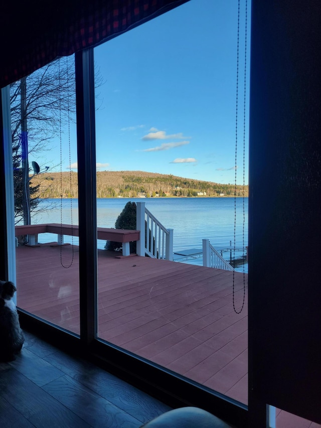 13 S Brook Ln, Eagle Lake, ME 04739 - dock with a water view and a balcony