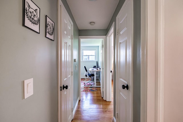 325 Ludlow St, Portland, ME 04102 - hallway featuring light wood-style flooring and a desk