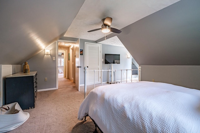 325 Ludlow St, Portland, ME 04102 - bedroom featuring light carpet, vaulted ceiling, ceiling fan, and a closet