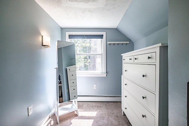 325 Ludlow St, Portland, ME 04102 - walk in closet featuring carpet flooring, lofted ceiling, and a baseboard radiator
