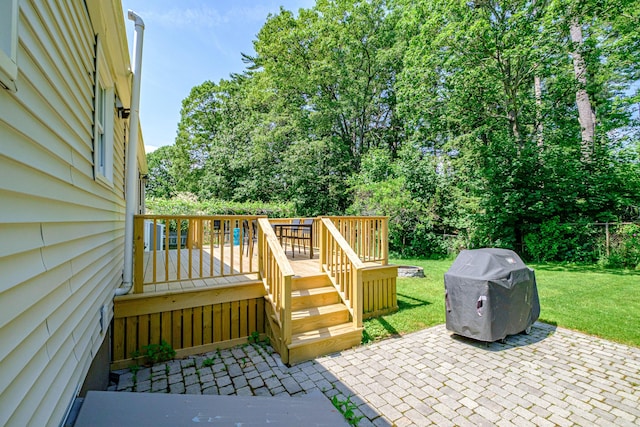 325 Ludlow St, Portland, ME 04102 - view of patio featuring grilling area, a wooden deck, and view of wooded area