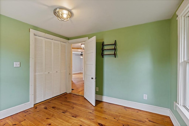 7 James St, Bingham, ME 04920 - unfurnished bedroom featuring wood-type flooring and a closet