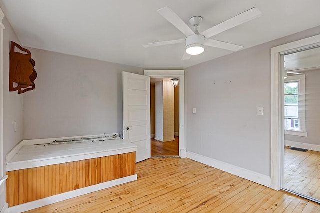 7 James St, Bingham, ME 04920 - unfurnished room featuring light wood-style floors and ceiling fan