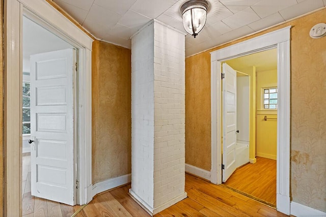 7 James St, Bingham, ME 04920 - corridor featuring wood-type flooring and baseboards